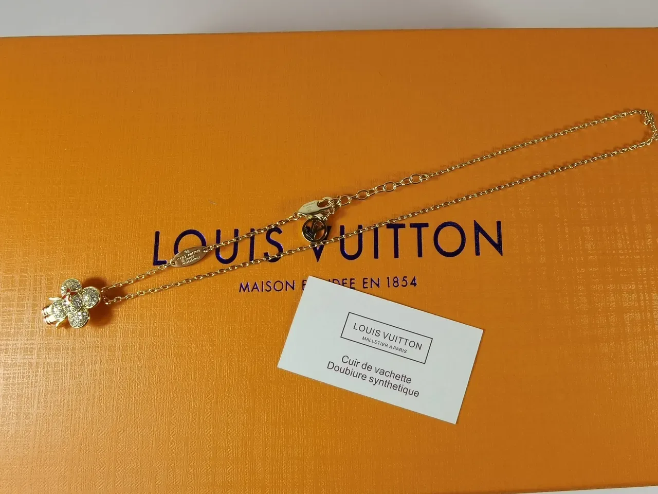 Louis Vuitton Gold-Tone Crystal Flower Pendant Necklace 6