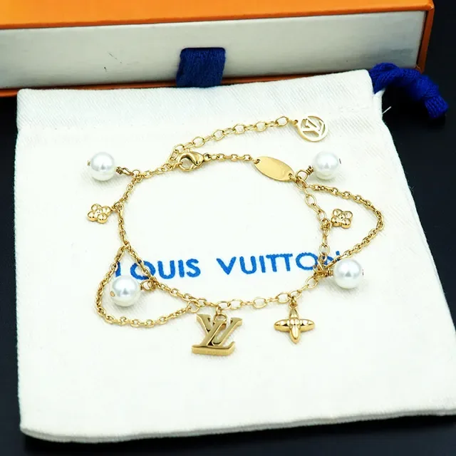 Louis Vuitton Gold-Tone Pearl and Charms Chain Bracelet 9