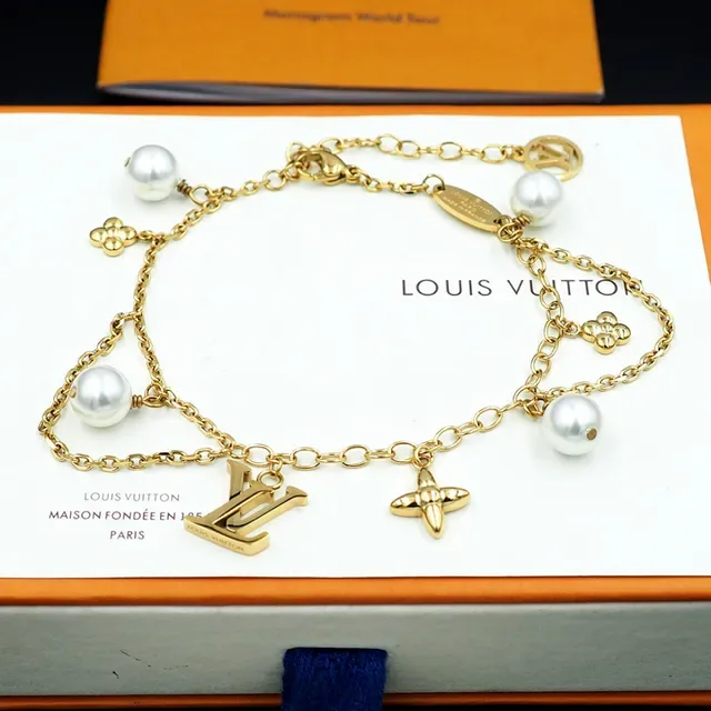 Louis Vuitton Gold-Tone Pearl and Charms Chain Bracelet 11
