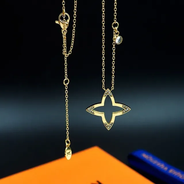 Louis Vuitton Gold Transparent Open Star Pendant Pavé Crystal Accents Necklace 5