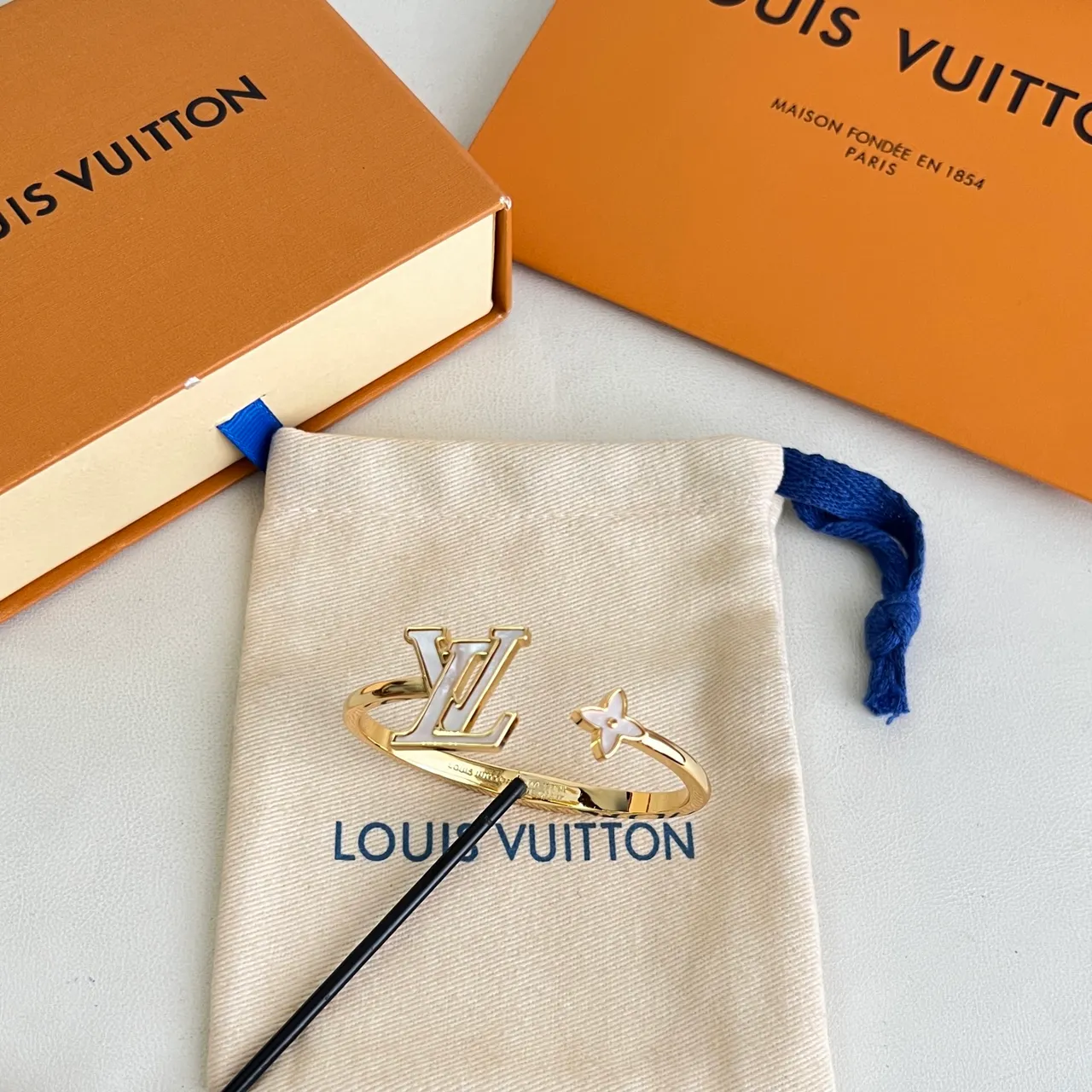 Louis Vuitton Gold White Open Bangle Bracelet 6