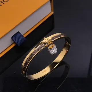 Louis Vuitton Lockit candado de cristal Monogram cuero tono dorado brazalete