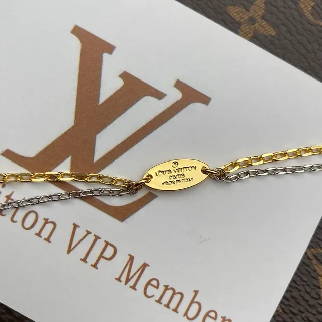 Louis Vuitton LV Circle Pendant Gold and Silver Tone Necklace 5