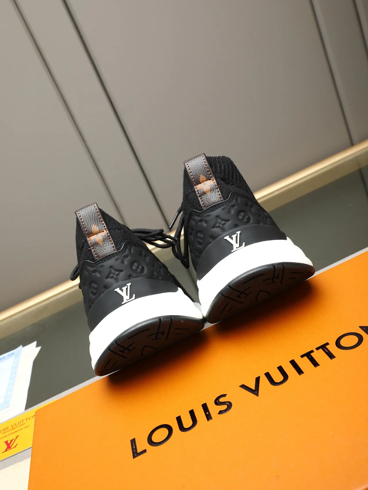 Louis Vuitton LV Trainer Black White Knit Sock-Fit Upper Monogrammed Heel Counter Lifestyle Sneakers 4