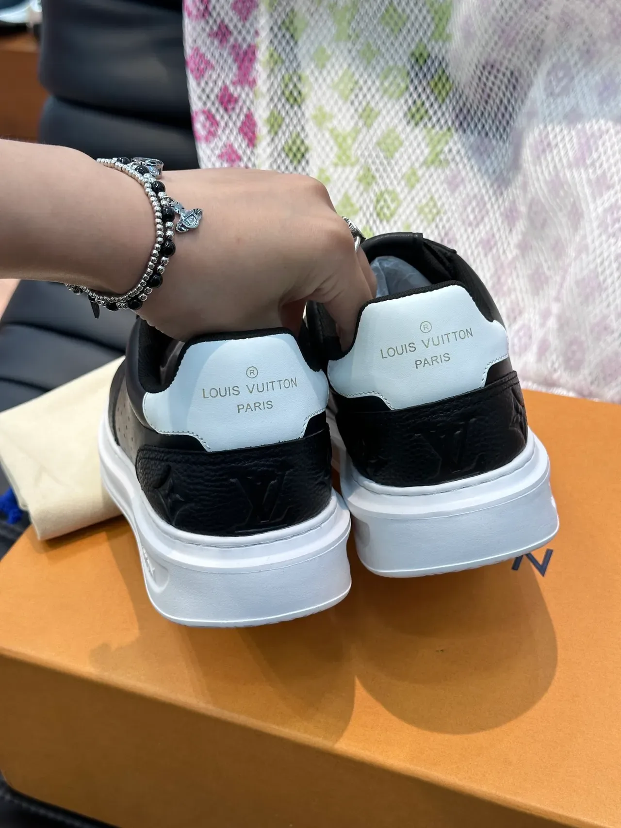Louis Vuitton LV Trainer Black White Low-Top Perforated Leather Lifestyle Sneakers 3
