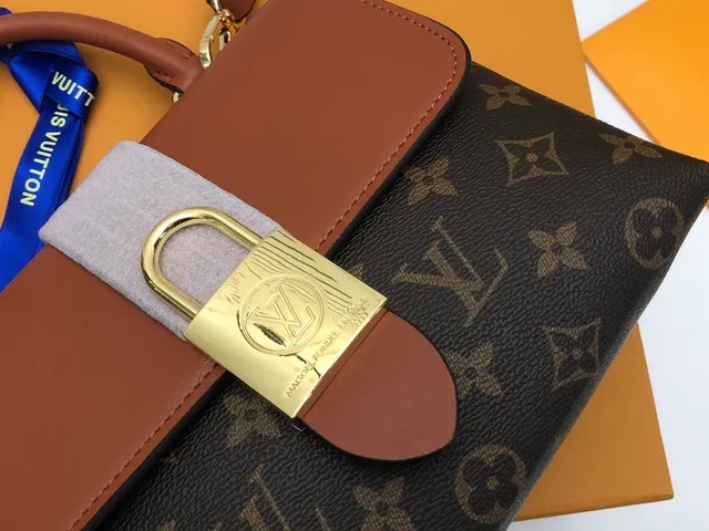 Bolso de mano Louis Vuitton Monogram Canvas y cuero tan con asa superior 5