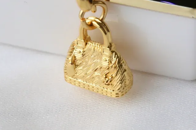 Louis Vuitton Monogram Canvas Gold-Tone Padlock Charm Bracelet 5