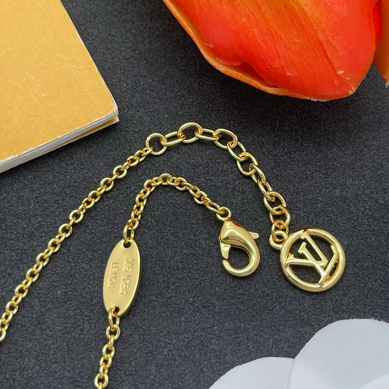 Louis Vuitton Monogram Jewelry Gold-Tone White Enamel LV and Flower Charm Bracelet 6