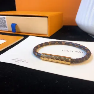 Louis Vuitton Pulsera de Cuero Monograma Marrón Dorado Trenzada con Broche Cilíndrico