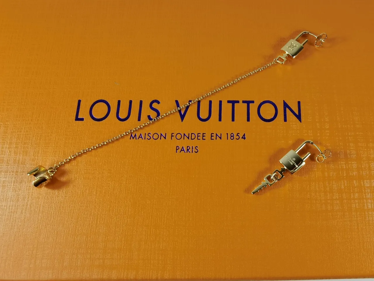 Louis Vuitton Monogram World Tour Lock-and-Key Gold-Tone Earrings 4