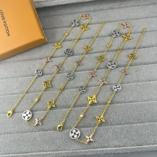 Louis Vuitton Multi-Charm Gold-Tone Floral and Star سوار