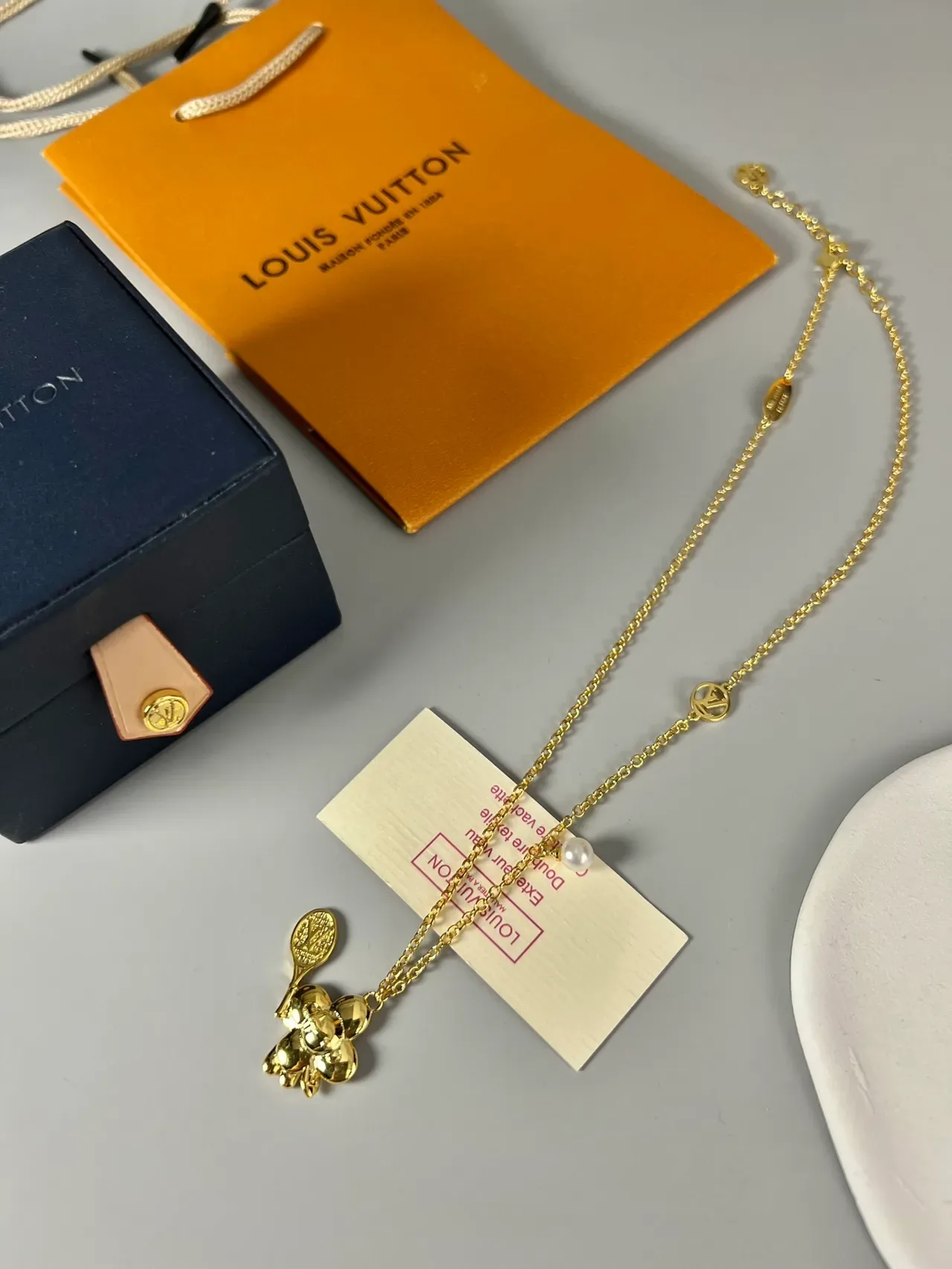 Louis Vuitton Multi-Charm Gold-Tone Pearl Necklace 8