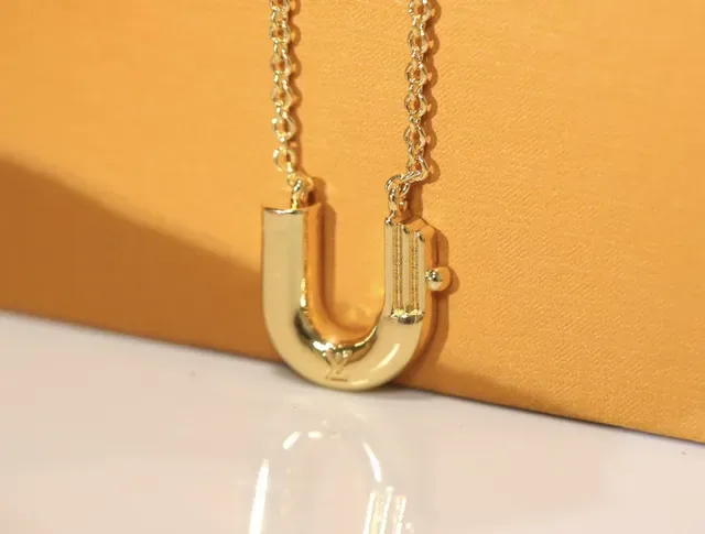 Louis Vuitton Sculptural Lowercase B Pendant Necklace 7