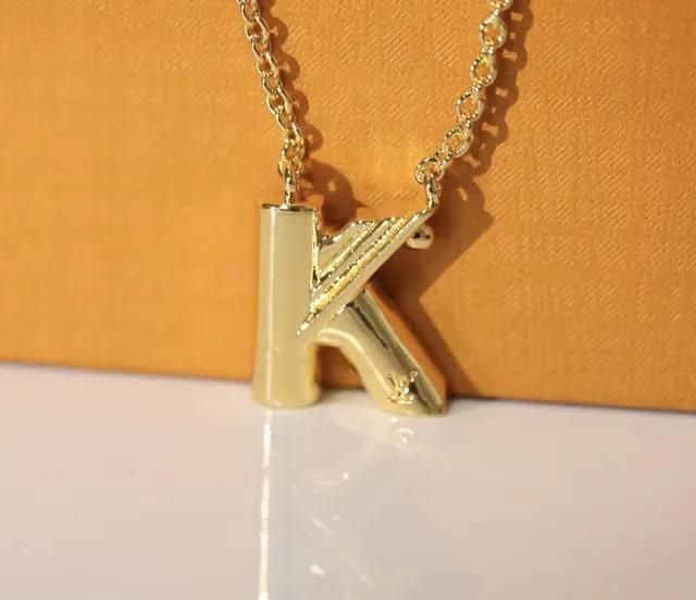 Louis Vuitton Sculptural Lowercase B Pendant Necklace 17