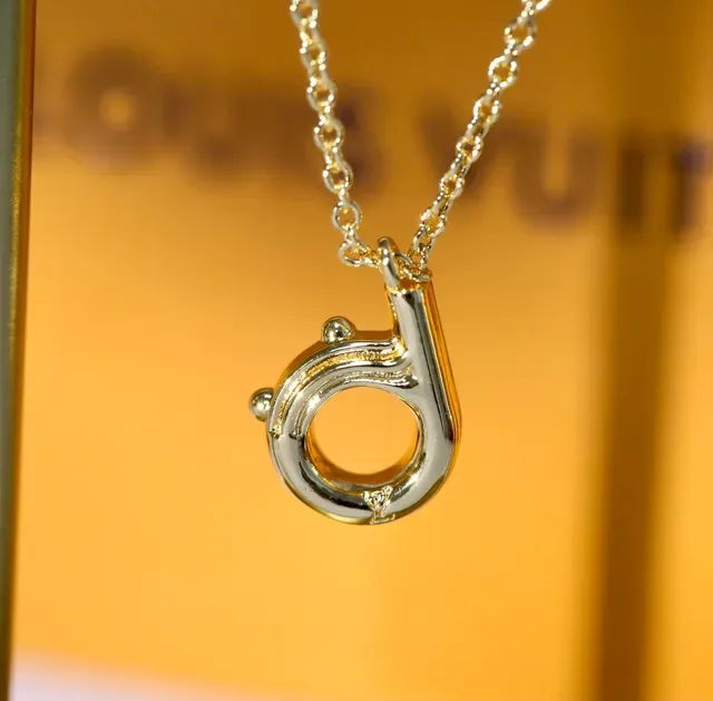 Louis Vuitton Sculptural Lowercase B Pendant Necklace 21