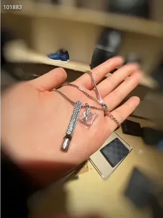 Louis Vuitton Silver Crystal-Encrusted Cylindrical Pendant Necklace 3