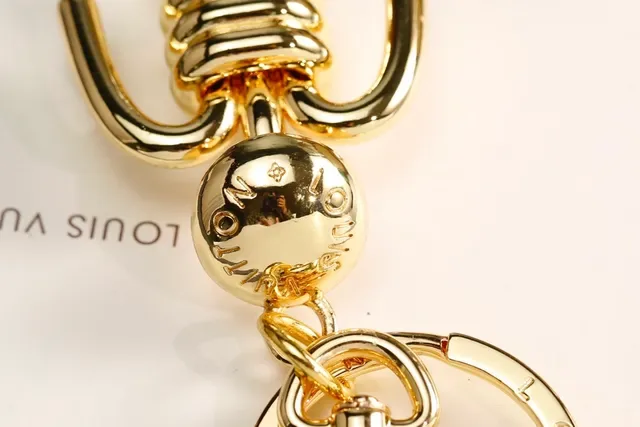 Louis Vuitton Silver Gold Articulated Stick-Figure Silhouette Coiled Torso Detail Crossbody Bag 3