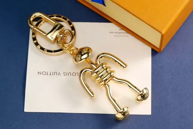 Louis Vuitton Silver Gold Articulated Stick-Figure Silhouette Coiled Torso Detail Crossbody Bag 6