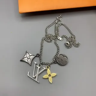 Louis Vuitton Silver Gold Multi-Charm Metallic Necklace