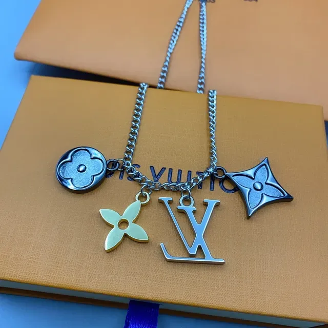 Louis Vuitton Silver Gold Multi-Charm Metallic Necklace 6
