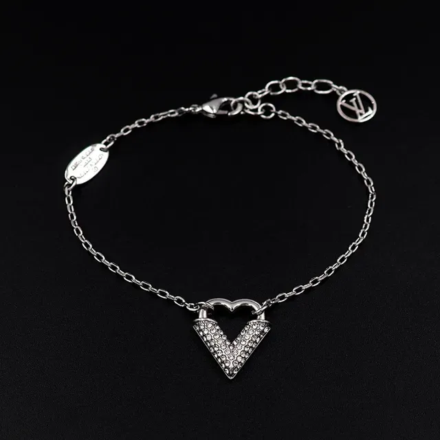 Louis Vuitton Silver Transparent Chain Crystal-Paved Heart Pendant Bracelet 4