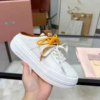 Miu Miu Wander Zapatillas Lifestyle Blancas Naranja Suela Plataforma Cordones Bicolor