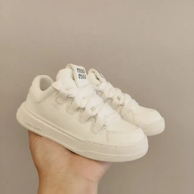 Miu Miu Chaussures Lifestyle à Semelle Plateforme Blanche avec Détails de Sangles Superposées 8