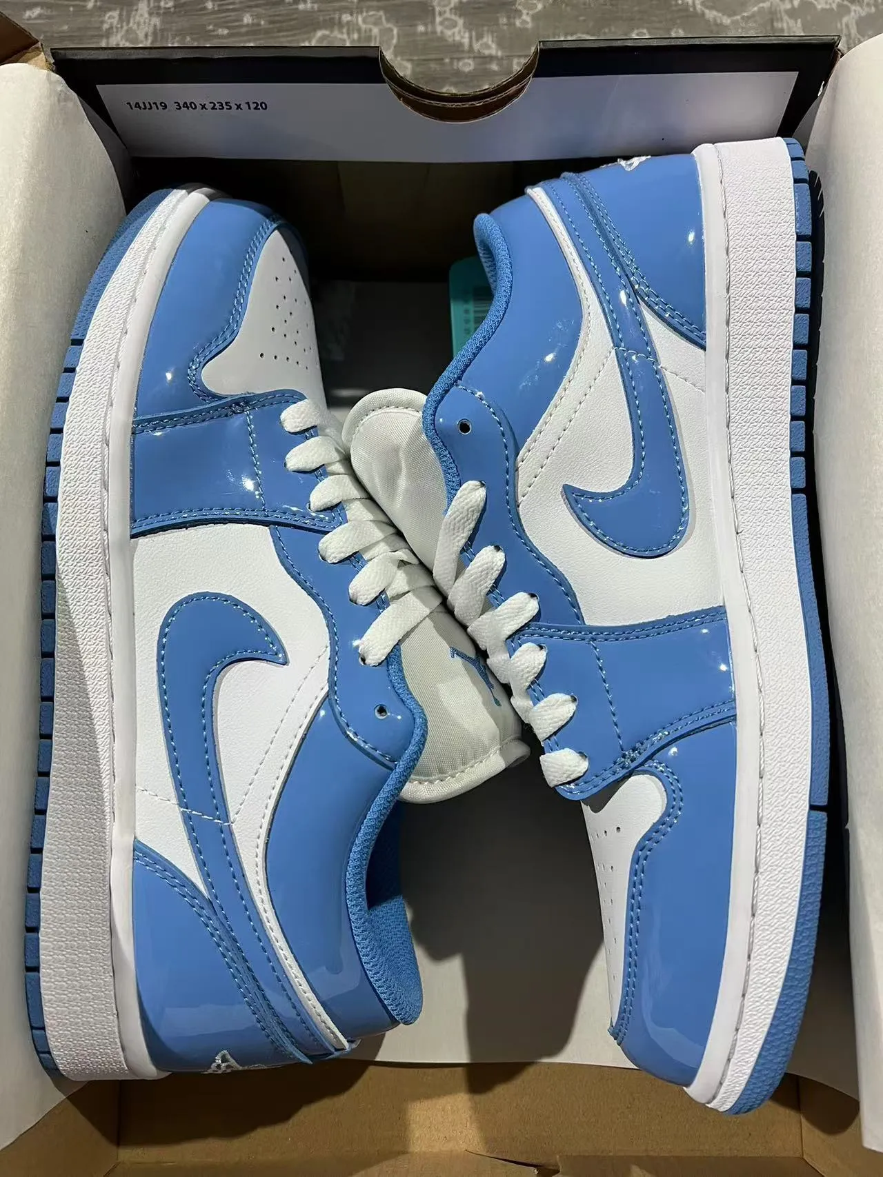 Nike Air Jordan 1 Low Glossy Blue and White Lifestyle Sneakers 9