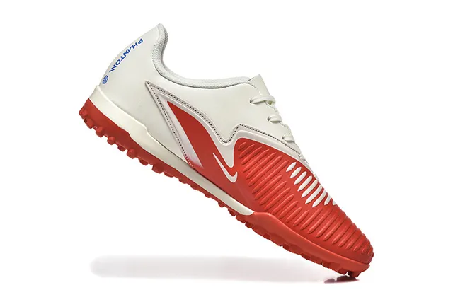 Nike Chaussures de football Turf Noir et Bleu, à coupe basse, avec dessus synthétique et recouvrement texturé de l'avant-pied 4
