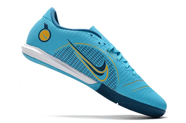 Nike Tênis de futebol indoor de corte baixo upper sintético overlay texturizado em grade color azul laranja 2