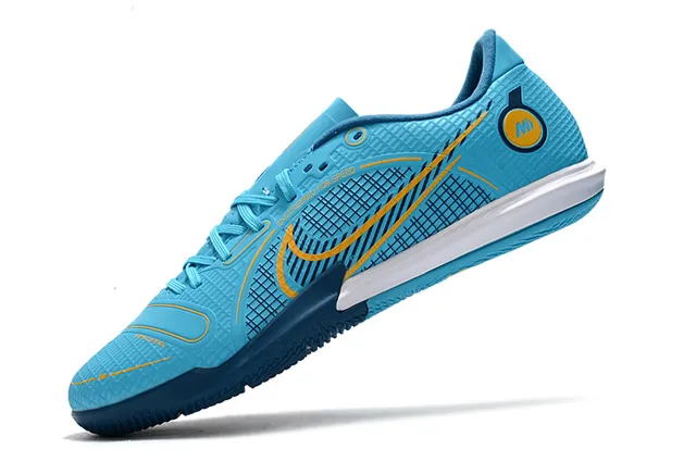 Nike Tênis de futebol indoor de corte baixo upper sintético overlay texturizado em grade color azul laranja 3