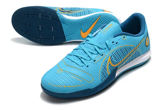 Nike Tênis de futebol indoor de corte baixo upper sintético overlay texturizado em grade color azul laranja 4