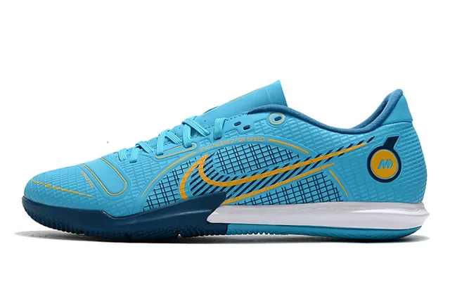 Nike Tênis de futebol indoor de corte baixo upper sintético overlay texturizado em grade color azul laranja 7