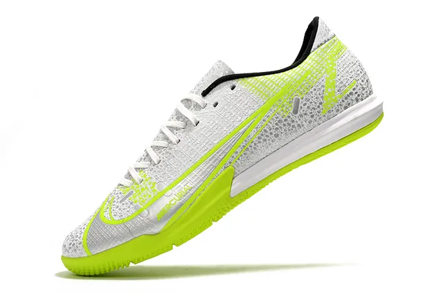 Nike Tênis de futebol indoor de corte baixo upper sintético overlay texturizado em grade color azul laranja 9