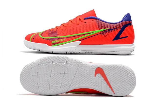 Nike Tênis de futebol indoor de corte baixo upper sintético overlay texturizado em grade color azul laranja 19