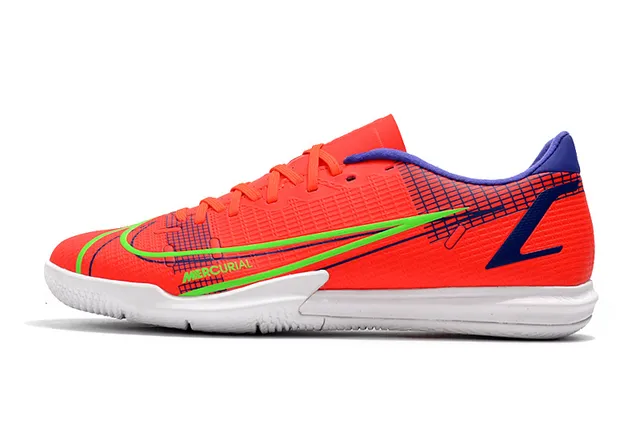 Nike Tênis de futebol indoor de corte baixo upper sintético overlay texturizado em grade color azul laranja 20