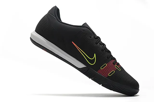 Nike Tênis de futebol indoor de corte baixo upper sintético overlay texturizado em grade color azul laranja 21