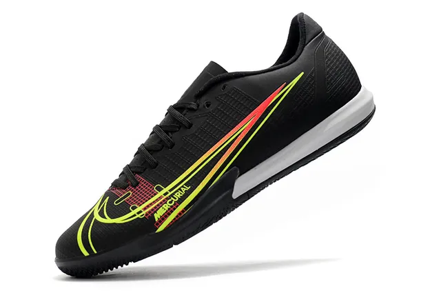 Nike Tênis de futebol indoor de corte baixo upper sintético overlay texturizado em grade color azul laranja 22