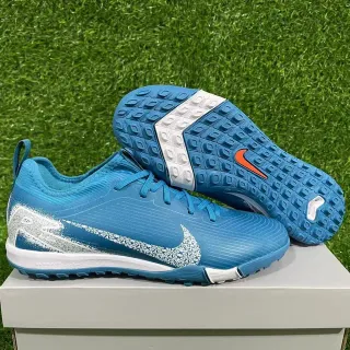 Nike Azul Blanco Zapatos de fútbol turf de bajo corte con upper sintético texturizado