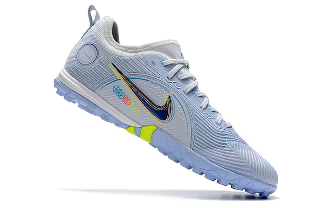 Nike Mercurial Chaussures de football avec empeigne en knit bleu orange motif en vague overlay synthétique pour pelouse artificielle 2