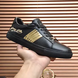 Philipp Plein 黑色和金色条纹皮革生活方式运动鞋