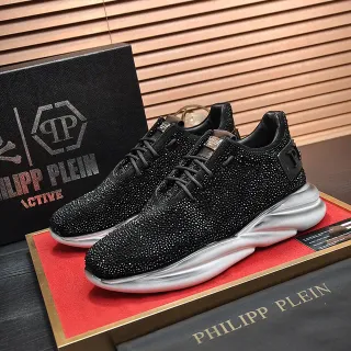 Philipp Plein काले चांदी स्टडेड निट अपर स्कल्प्टेड वेव मिडसोल चंकी स्नीकर्स