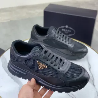 Prada أحذية رياضية أسلوب حياة سوداء بكعب سميك من الشبكة والجلد