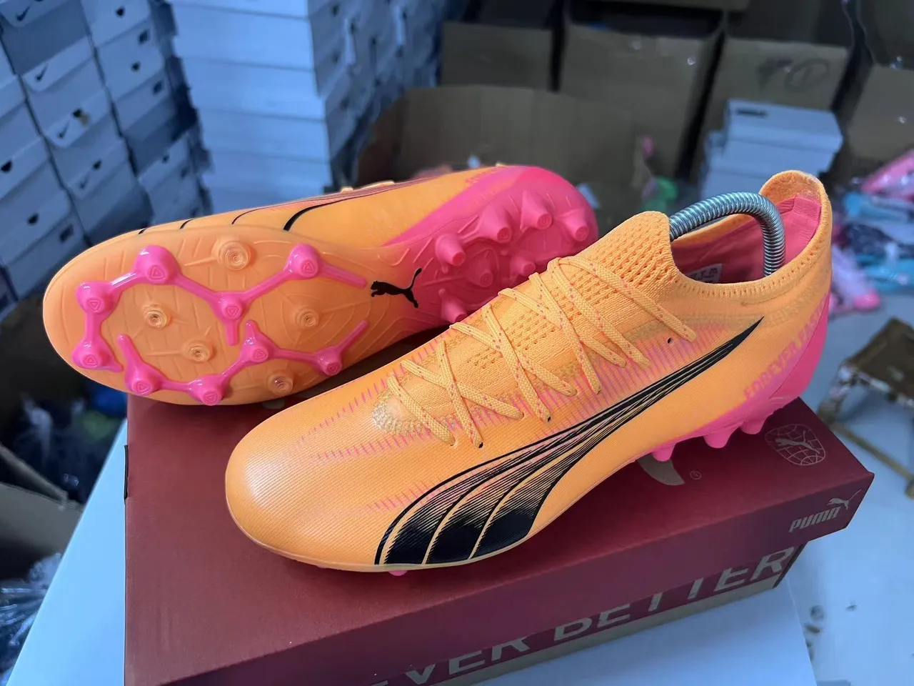 Puma Future Z Faster برتقالي وردي أرض صلبة أحذية كرة القدم 14