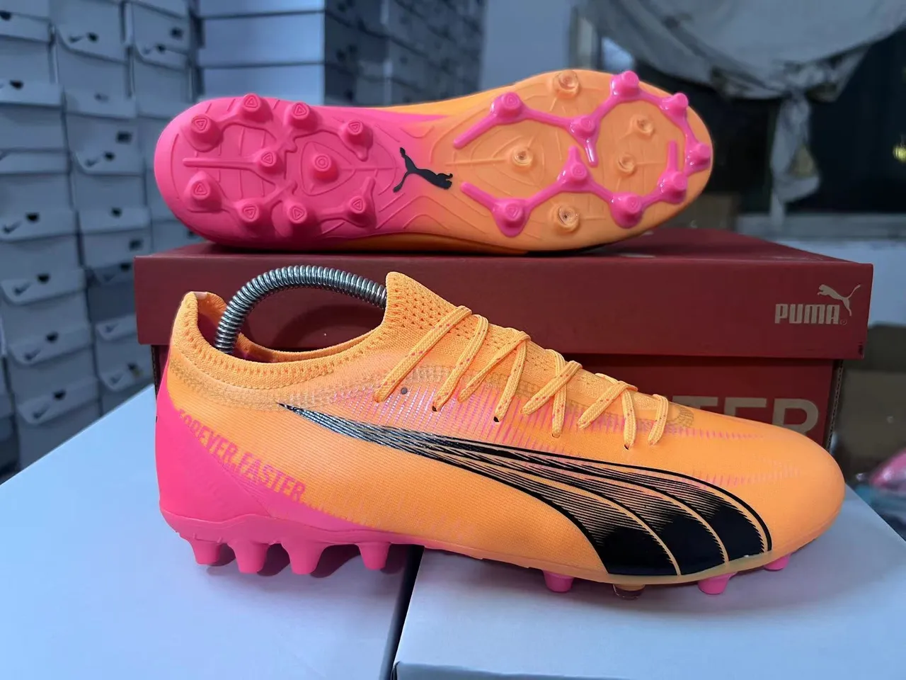 Puma Future Z Faster برتقالي وردي أرض صلبة أحذية كرة القدم 17