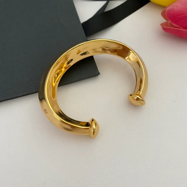 Saint Laurent Bracelet Ouvert Poli en Or 9