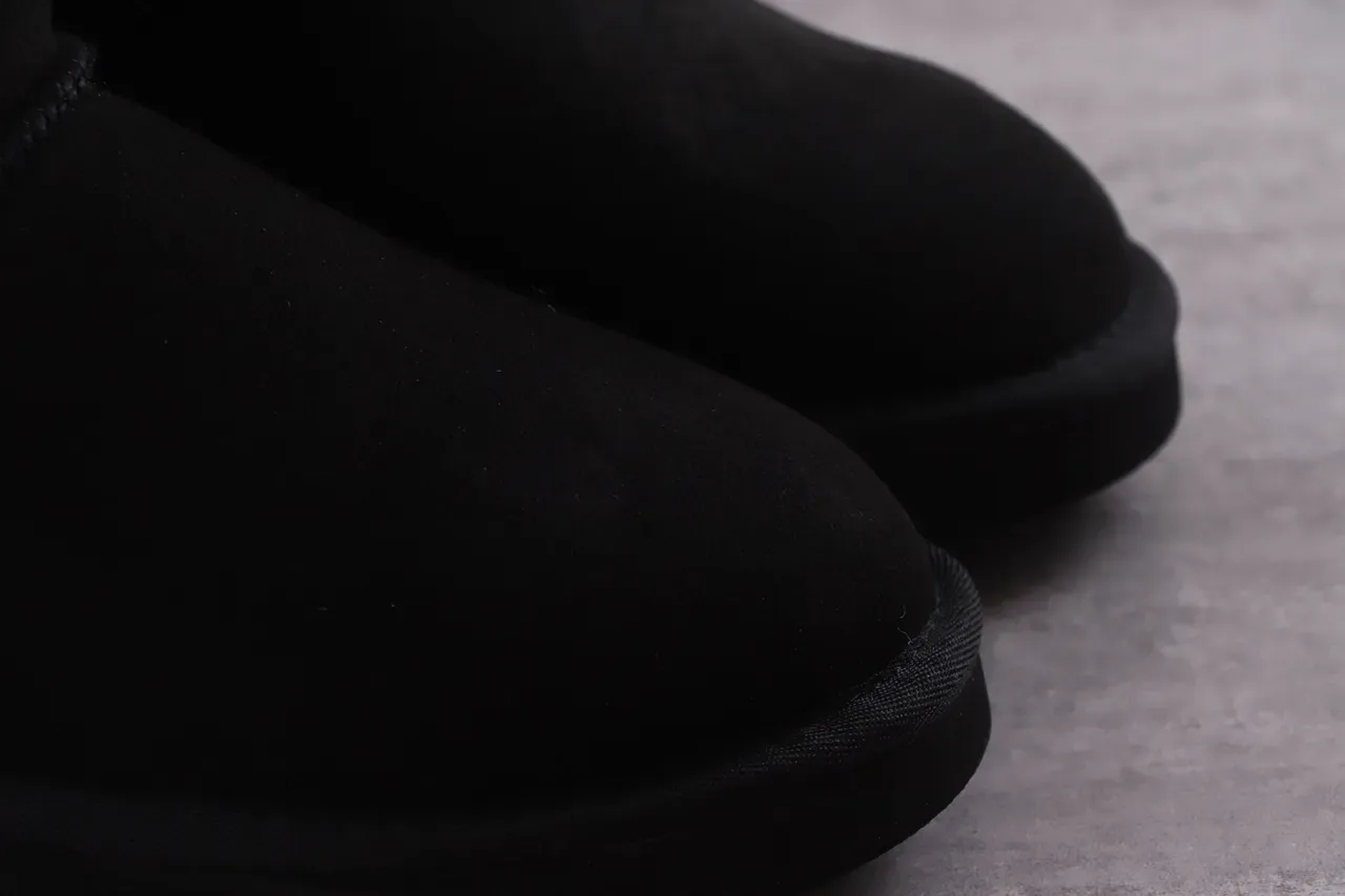 UGG Classic Tall Botas de rodilla negras con lazo 5