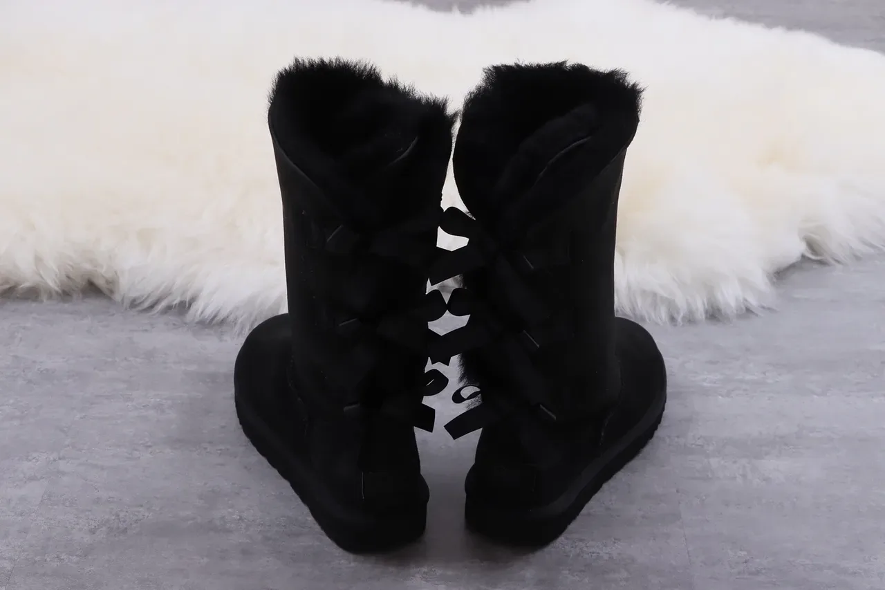 UGG Classic Tall Botas de rodilla negras con lazo 7