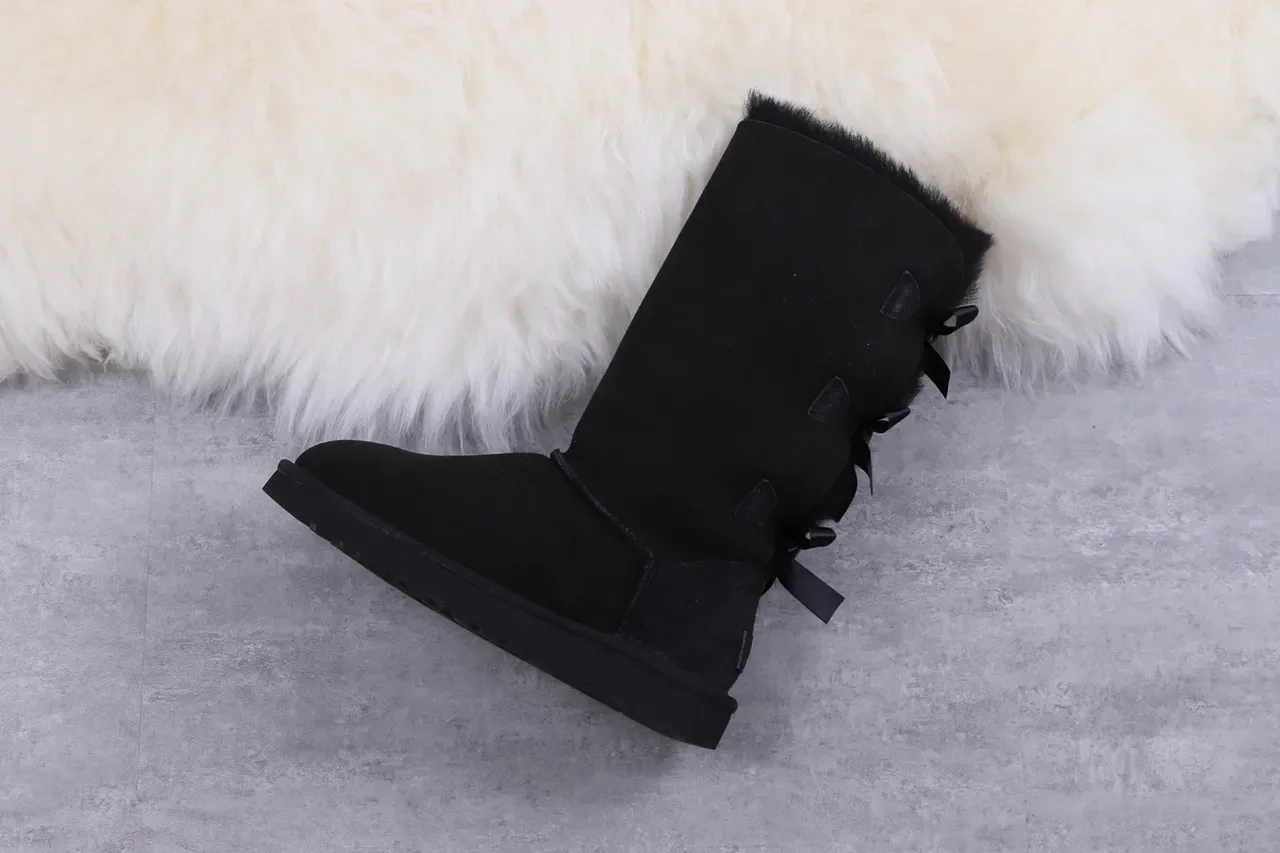 UGG Classic Tall Botas de rodilla negras con lazo 9