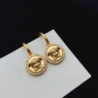 Versace Medusa Icon Pendientes colgantes de cristal en tono dorado